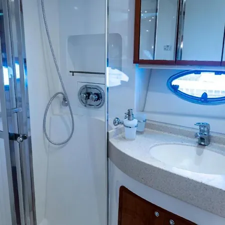 Yacht Experience Tenerife 24h Tour With Private Skipper & Private Hostess With Cocktails, Sandwiches, Free Minibar And Free Islandwide Pick-up And Return In A Tesla S Sportscar Botel