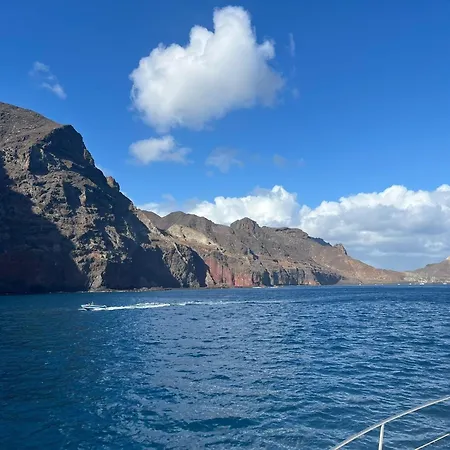 Yacht Experience Tenerife 24h Tour With Private Skipper & Private Hostess With Cocktails, Sandwiches, Free Minibar And Free Islandwide Pick-up And Return In A Tesla S Sportscar Botel