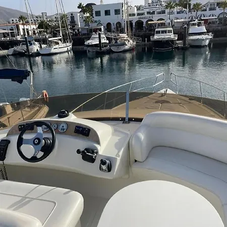 Botel Yacht Experience Tenerife 24h Tour With Private Skipper & Private Hostess With Cocktails, Sandwiches, Free Minibar And Free Islandwide Pick-up And Return In A Tesla S Sportscar