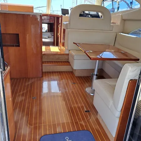 Botel Yacht Experience Tenerife 24h Tour With Private Skipper & Private Hostess With Cocktails, Sandwiches, Free Minibar And Free Islandwide Pick-up And Return In A Tesla S Sportscar