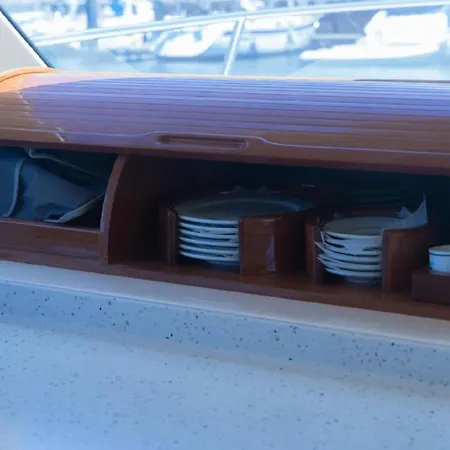 Yacht Experience Tenerife 24h Tour With Private Skipper & Private Hostess With Cocktails, Sandwiches, Free Minibar And Free Islandwide Pick-up And Return In A Tesla S Sportscar *