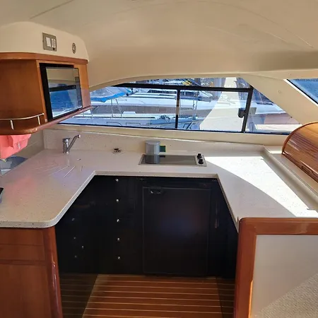 Botel Yacht Experience Tenerife 24h Tour With Private Skipper & Private Hostess With Cocktails, Sandwiches, Free Minibar And Free Islandwide Pick-up And Return In A Tesla S Sportscar