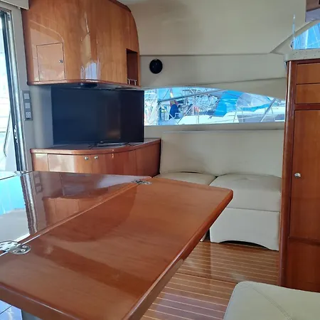 Yacht Experience Tenerife 24h Tour With Private Skipper & Private Hostess With Cocktails, Sandwiches, Free Minibar And Free Islandwide Pick-up And Return In A Tesla S Sportscar Botel