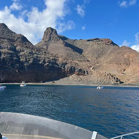 Yacht Experience Tenerife 24h Tour With Private Skipper & Private Hostess With Cocktails, Sandwiches, Free Minibar And Free Islandwide Pick-up And Return In A Tesla S Sportscar Botel