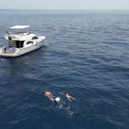 Yacht Experience Tenerife 24h Tour With Private Skipper & Private Hostess With Cocktails, Sandwiches, Free Minibar And Free Islandwide Pick-up And Return In A Tesla S Sportscar Botel *