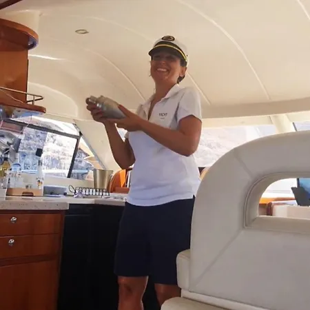 Botel Yacht Experience Tenerife 24h Tour With Private Skipper & Private Hostess With Cocktails, Sandwiches, Free Minibar And Free Islandwide Pick-up And Return In A Tesla S Sportscar *