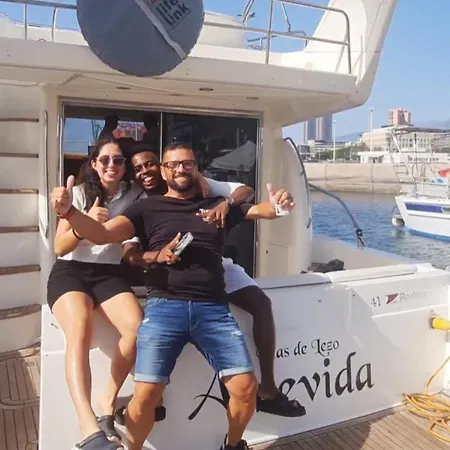 Yacht Experience Tenerife 24h Tour With Private Skipper & Private Hostess With Cocktails, Sandwiches, Free Minibar And Free Islandwide Pick-up And Return In A Tesla S Sportscar